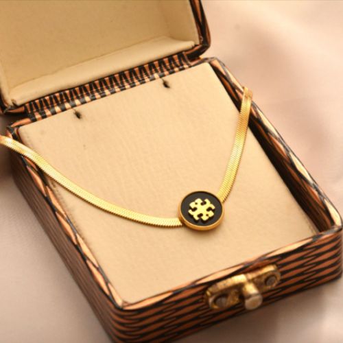 Elegant Gold-Plated Round Pendant Necklace with Black Enamel Inlay